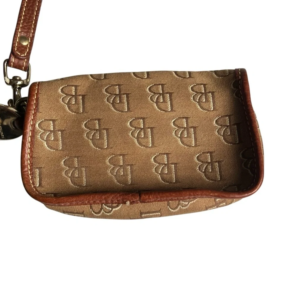 Dooney and Bourke signature logo tan leather and‎ brown monogram fabric wristlet